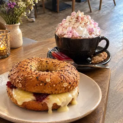 Seeded bagel with hot chocolate